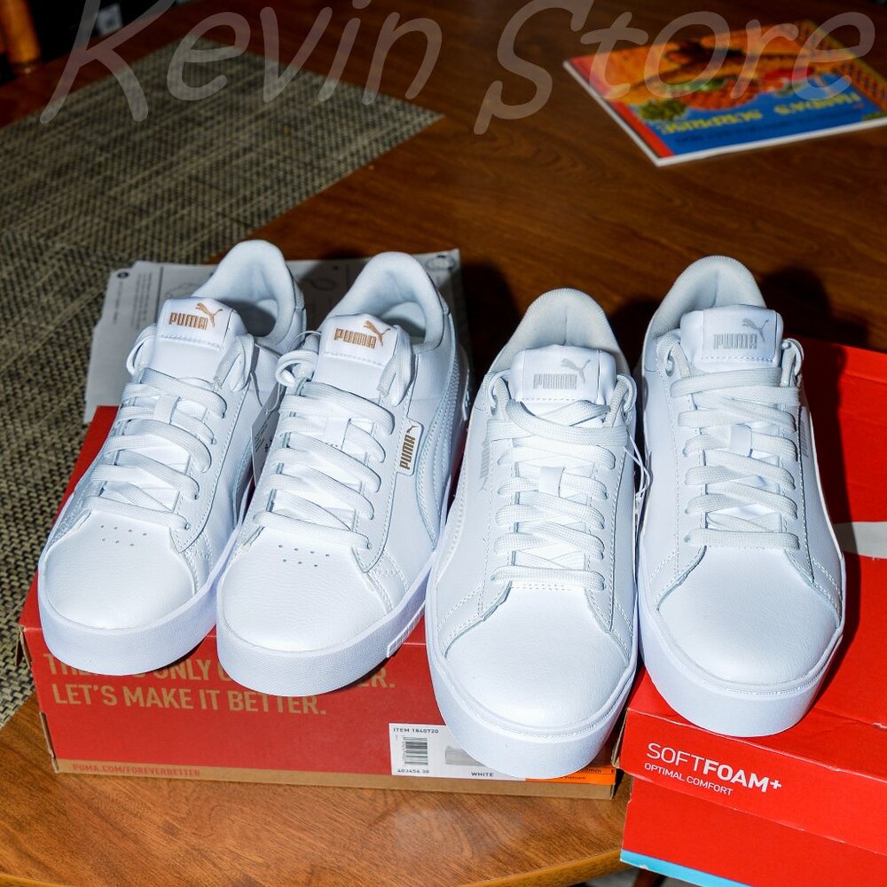 2 pairs white Puma women sneakers . Price is for 2‎ .